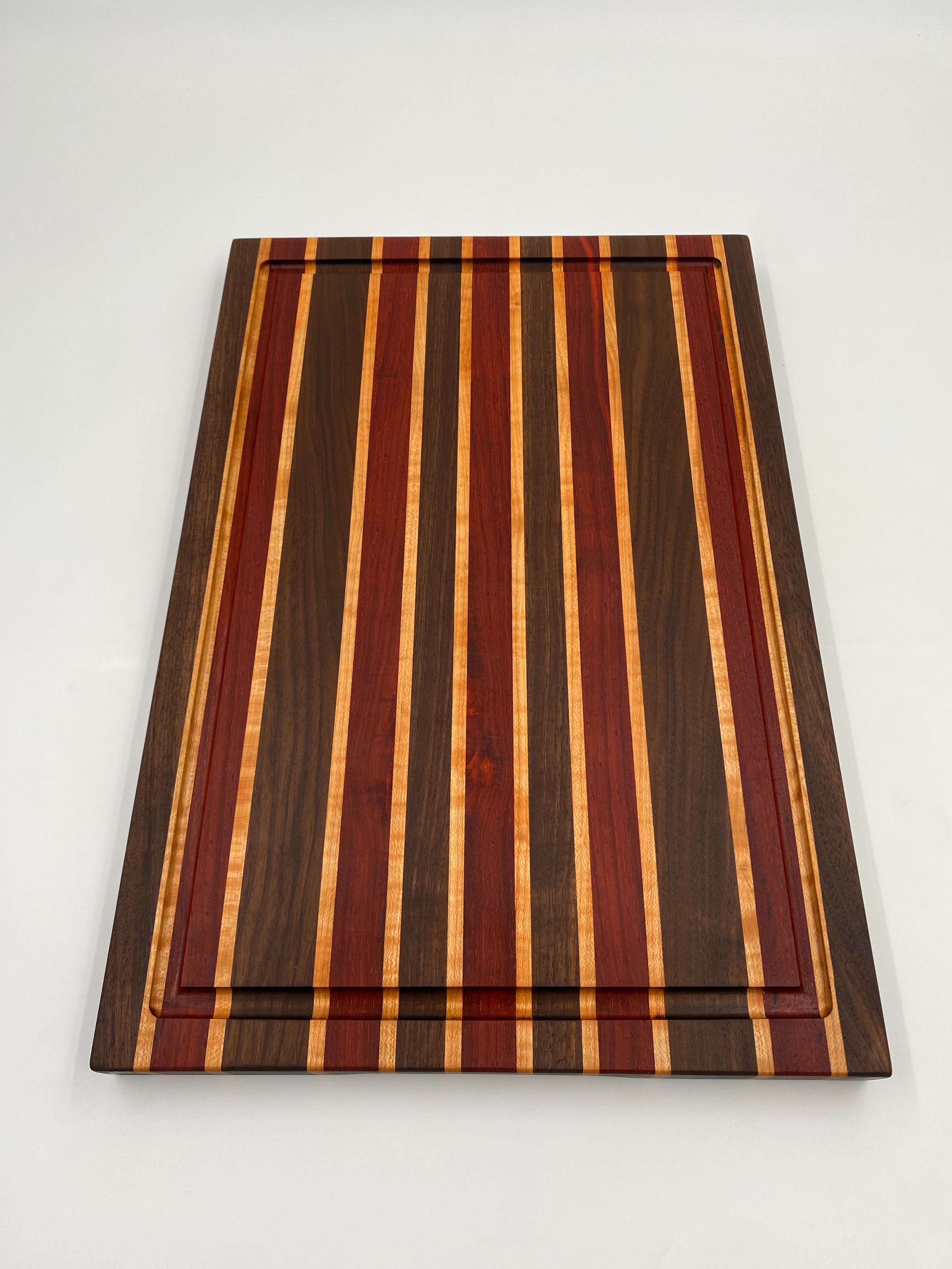 Handmade Paduak, Walnut and Maple Edge Grain Cutting Board with Juice Groove and Handles - 12x18x1.25 Inch Charcuterie Serving Board