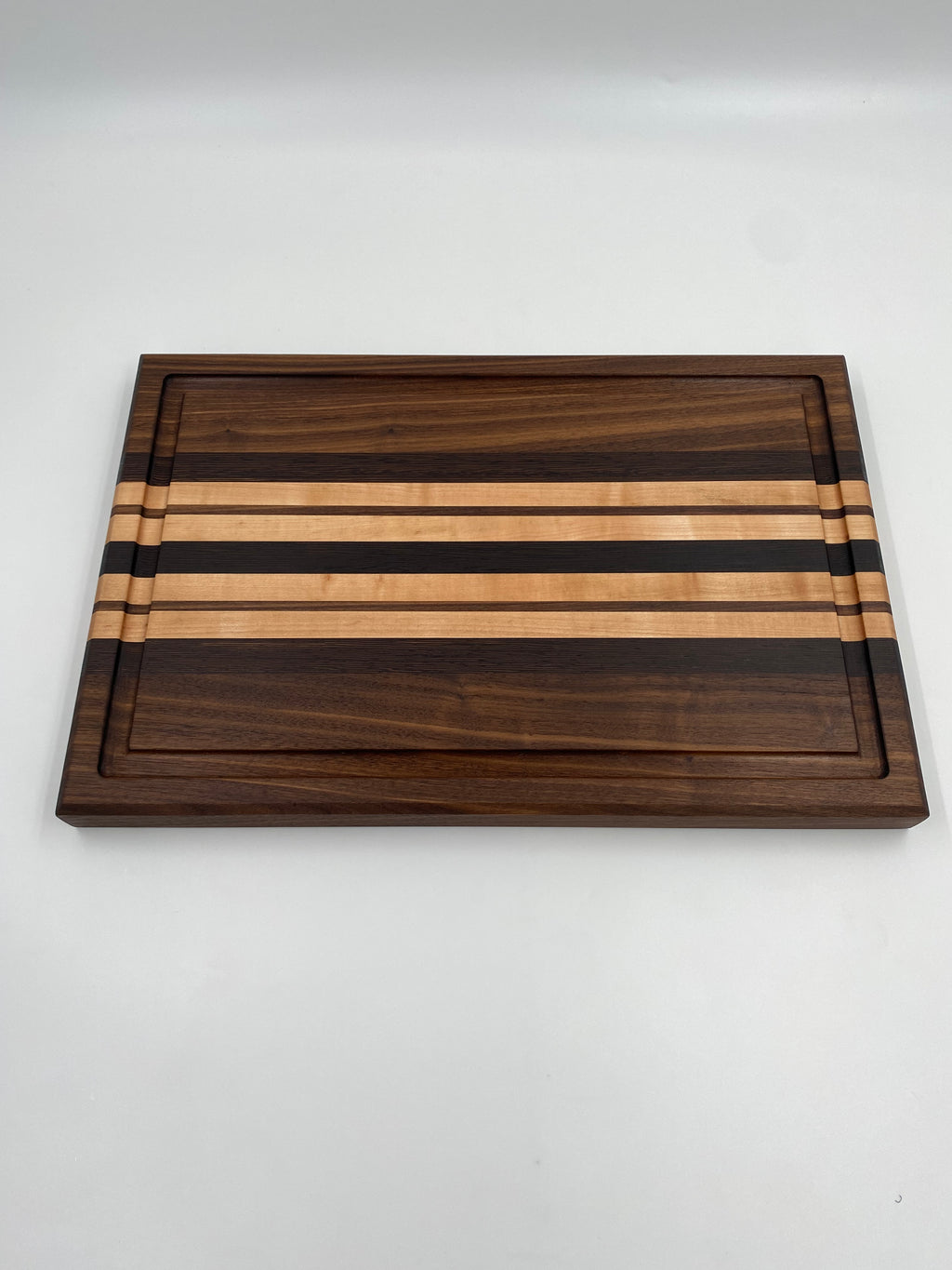 Handmade Exotic Wenge, Walnut, and Maple Edge Grain Cutting Board with Juice Groove and Handles - 12 x 18 x 1.25 Inch  Charcuterie Serving Board